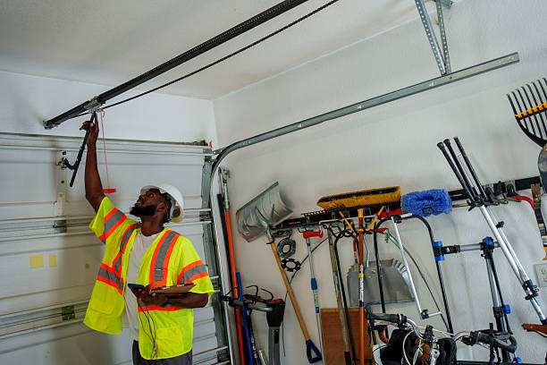 Professional Garage Door Panel Replacement technician working in Fairview, OK